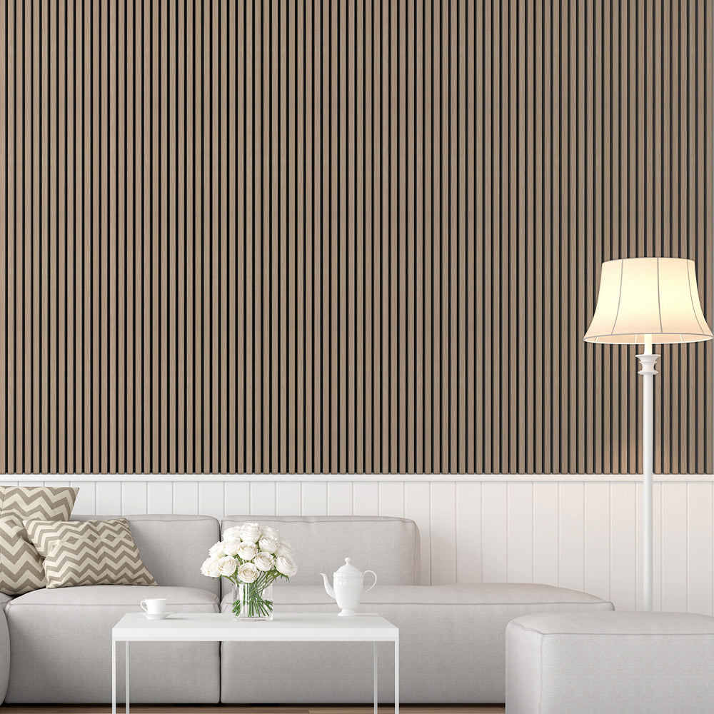 Elegant living room with walls adorned with American natural walnut acoustic slat wood panels with black felt, furnished with a beige sofa, coffee table, and a floor lamp, creating a stylish and quiet ambiance.