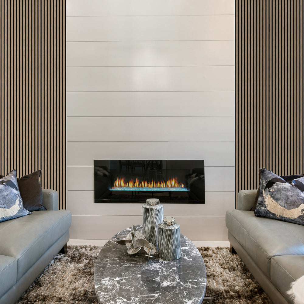 Contemporary living room with black felt natural walnut acoustic slat wall panels and a sleek fireplace. Reduces noise and elevates modern décor.