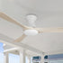 52 inch 3-blade flush mount wood ceiling fan in white with light installed on a modern outdoor porch ceiling. 
