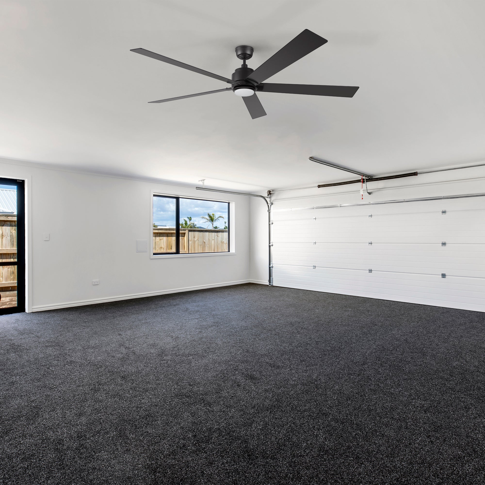 Aspen Smart Ceiling Fan with LED Light Remote, 70 inch, installed in a large garage with a clean and modern look.  