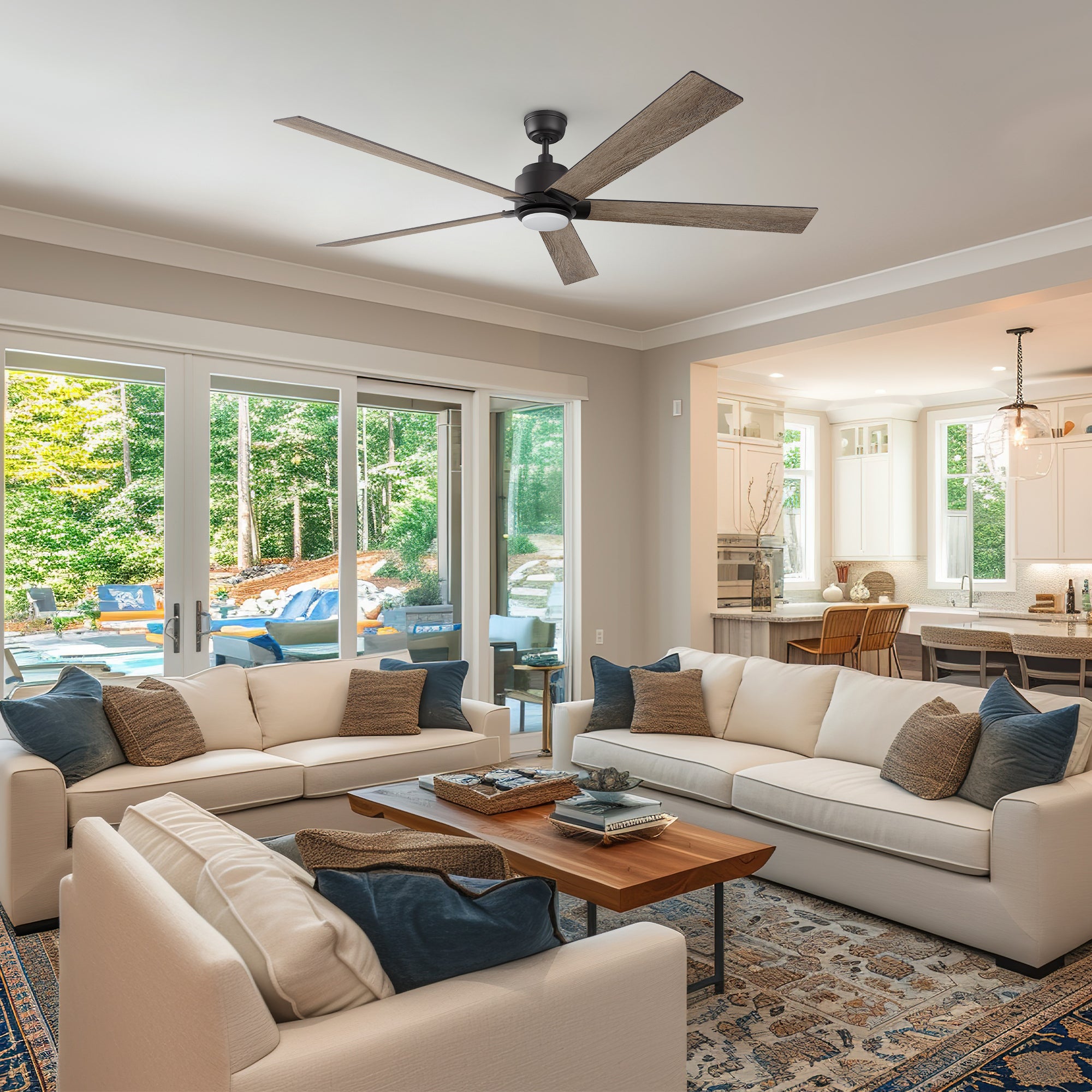 Traditional living room with elegant furnishings, showcasing the Aspen 70-inch smart ceiling fan in black, adding modern functionality and cooling comfort. 