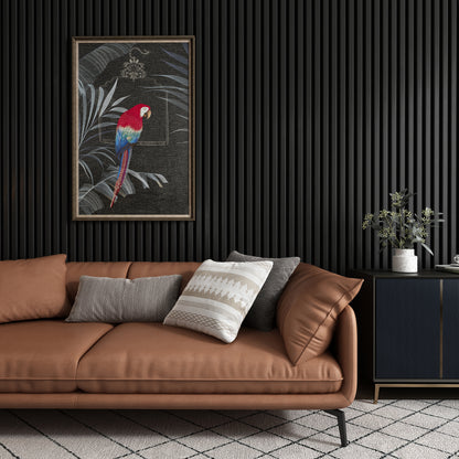 Modern living room with black matte acoustic slat wall panels, complemented by an orange sofa and bold wall art, creating a stylish and vibrant look.