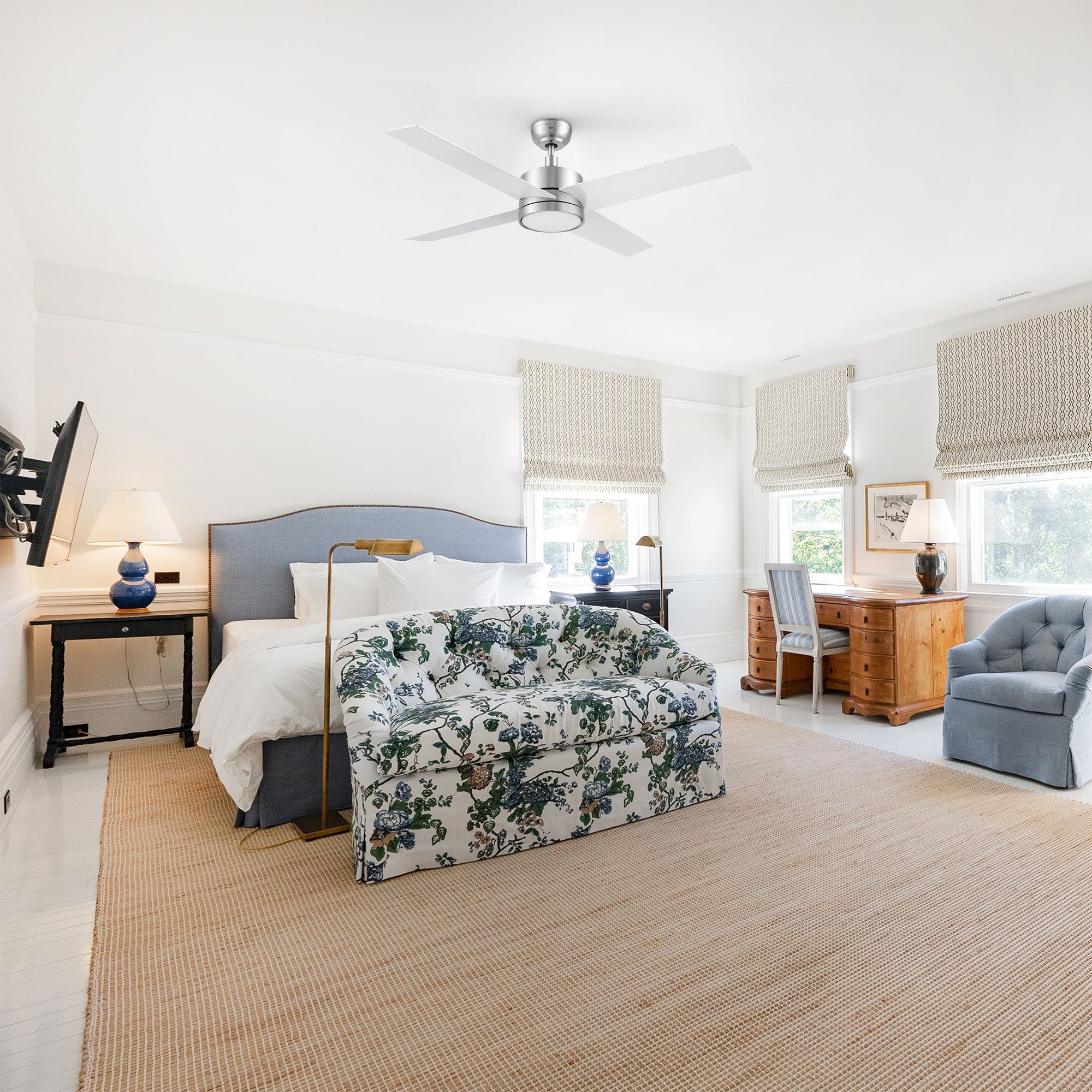 Smafan Rossendale 52-inch brushed nickel ceiling fan in silver with LED light installed in a traditional bedroom with floral bedding and classic furniture. 