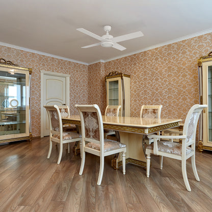 Smafan Rossendale 52-inch white ceiling fan with LED light in a traditional living room with vintage wallpaper and classic white dining set. 