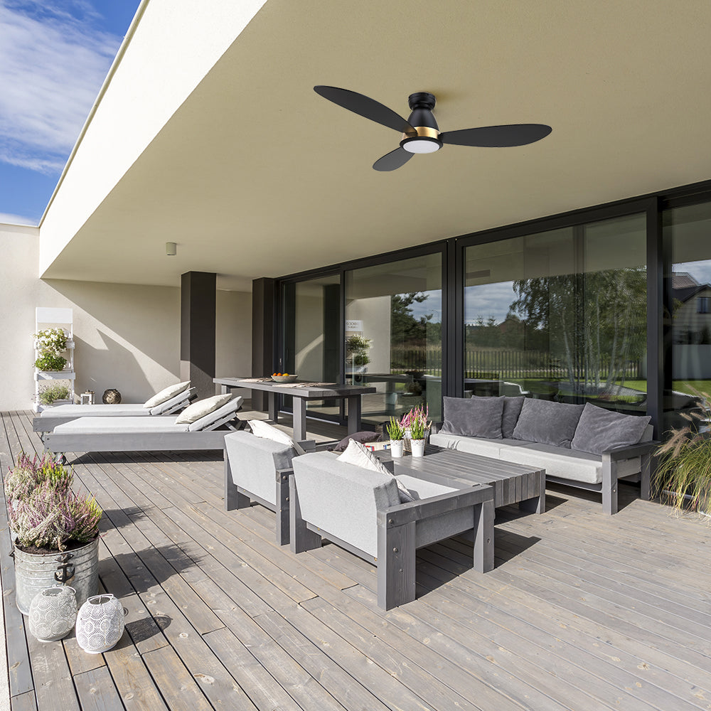 This 52-inch low-profile outdoor ceiling fan in Black  with reversible motor and remote control is perfect for smaller outdoor areas or rooms with lower ceilings. 