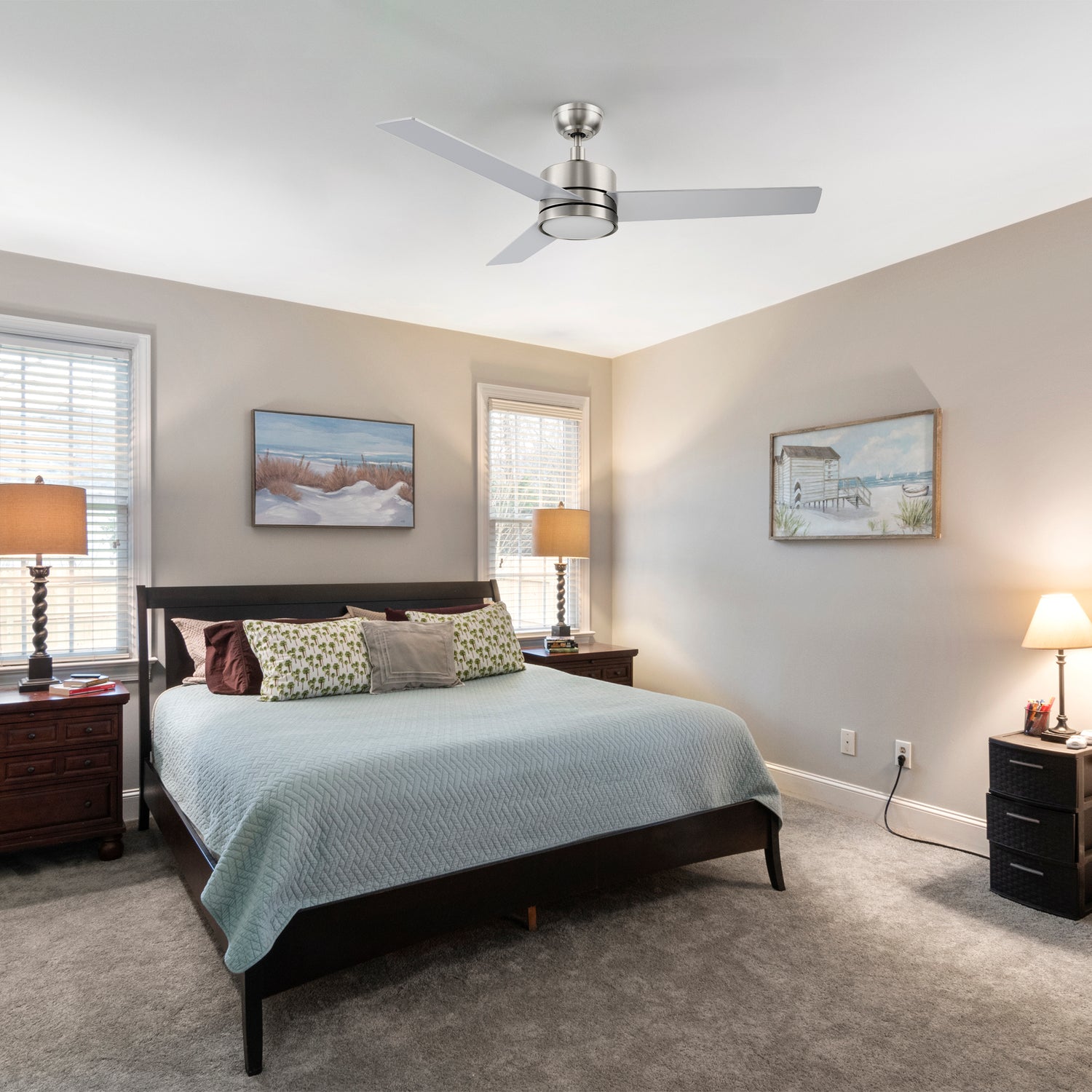Traditional bedroom featuring the Carro Smafan 52-inch Louy ceiling fan in brushed nickel with integrated LED light, installed above a wooden bed with decorative pillows and surrounded by classic furnishings and soft lighting. 
