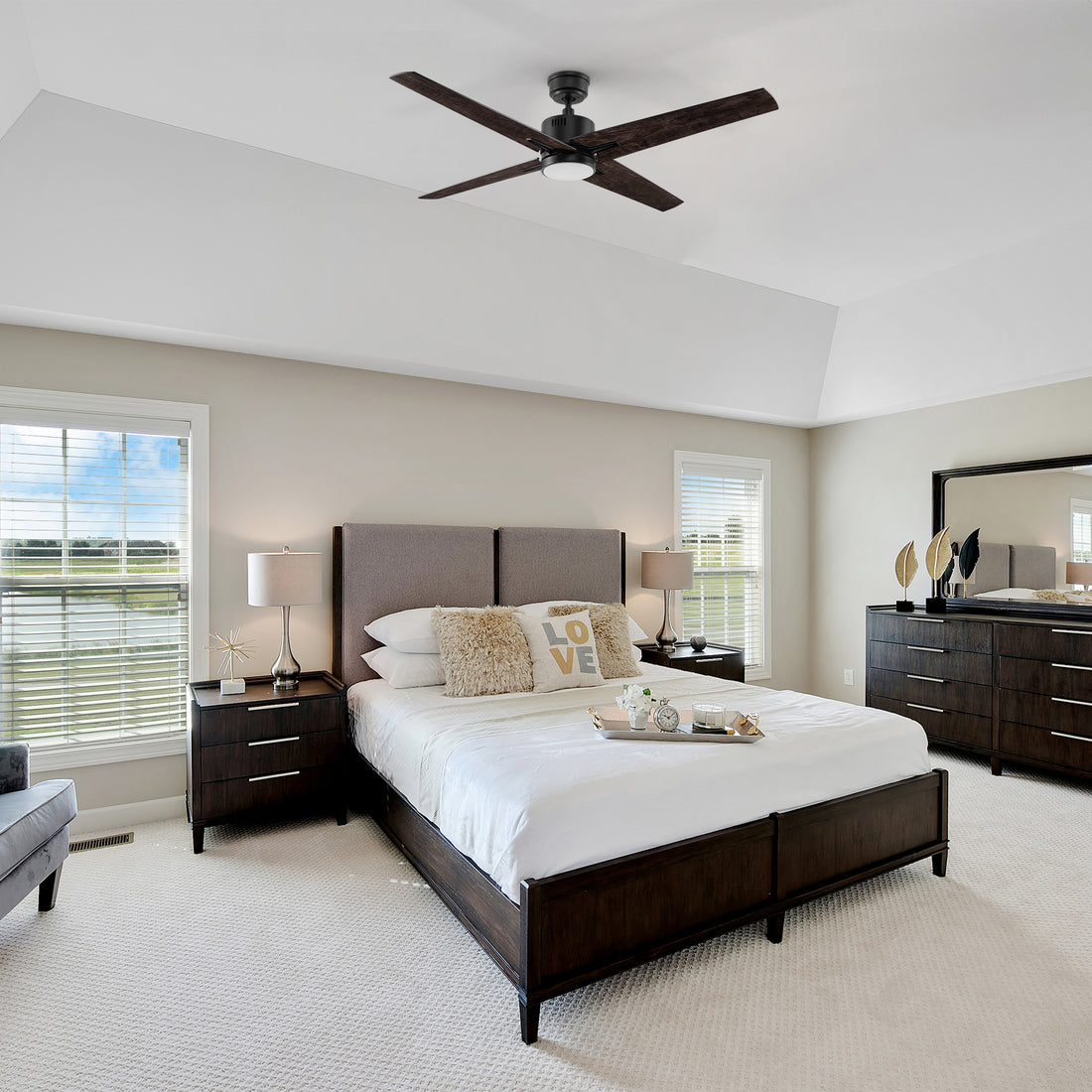 Carro Smafan Skye 52-inch modern ceiling fan with LED light and smart remote, installed in a contemporary bedroom. 