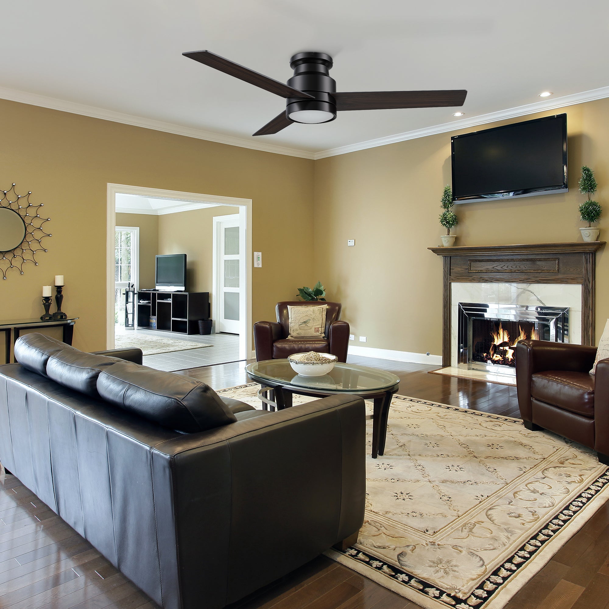 52inch low profile ceiling fan with LED light well matches to the black sofa in modern living room. 
