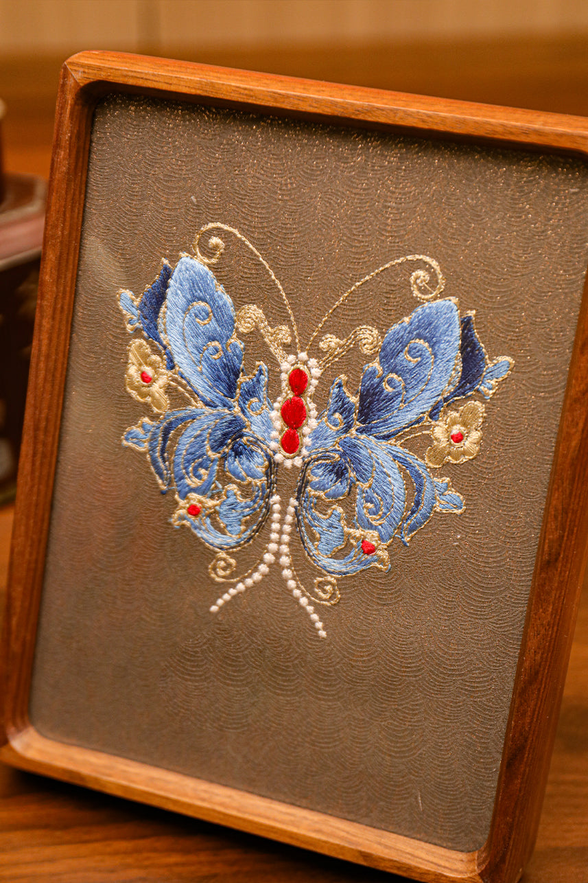 Embroidery_Designs_of_Butterfly_For_Textile_Art_placed_on_table_for_decor