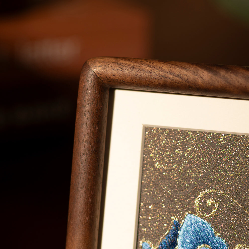 An Embroidered artwork with high quality wooded framed.