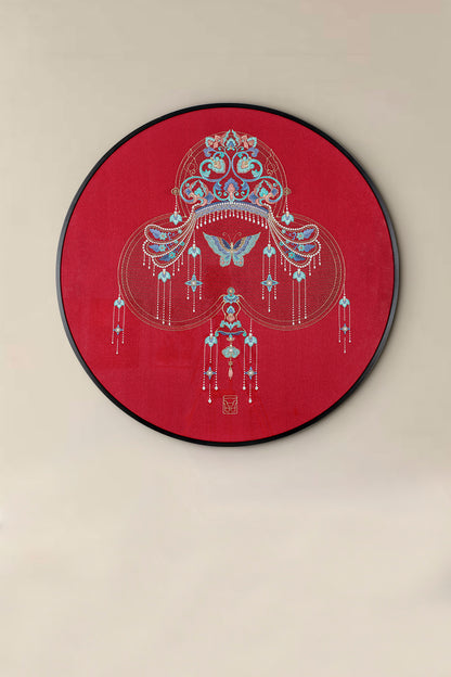 A piece of Oriental embroidery art is placed on the wall.