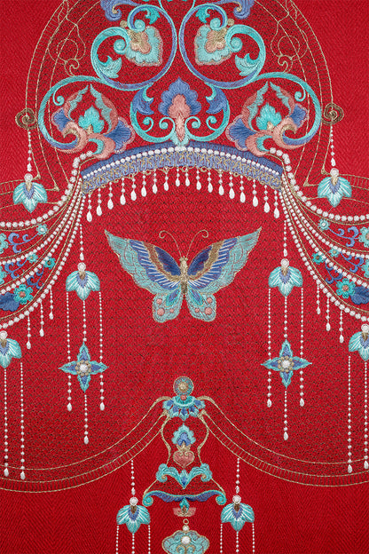 An embroidery painting of a phoenix coronet.
