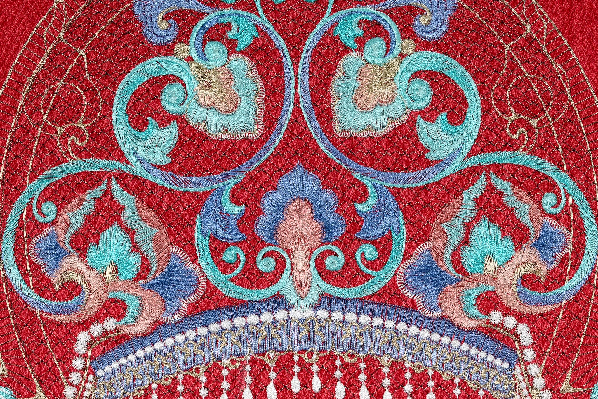 Upper detail of an Oriental phoenix crown's phoenixes embroidery artwork.