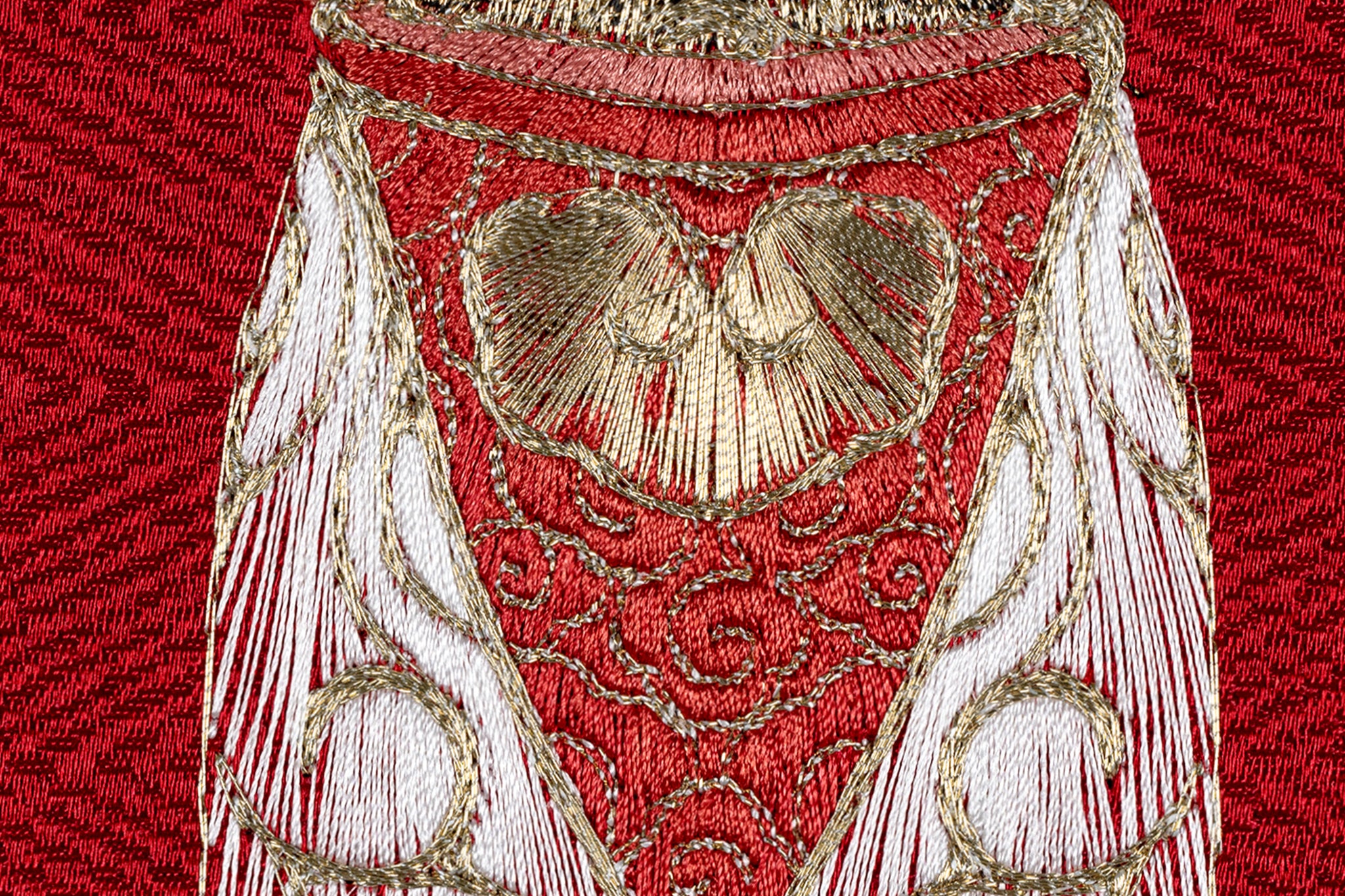Main body detail on cicada embroidery work.