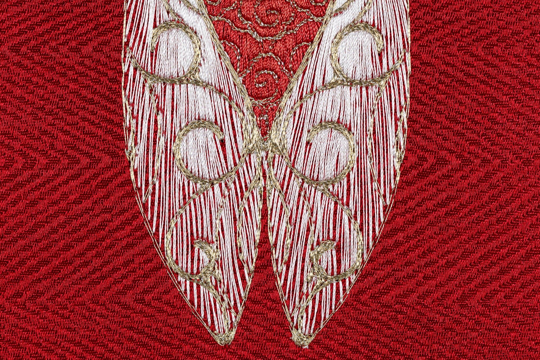 Wing detail on cicada embroidery artwork.