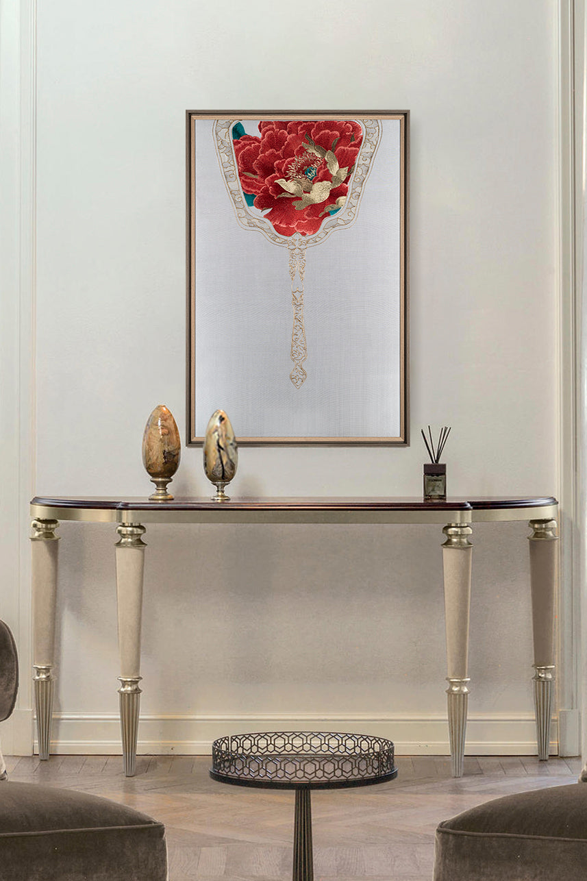 Hung over the side table as a wall art, this work of art is embroidered with a royal fan, and the royal fan is embroidered with red peony flowers symbolizing nobility.