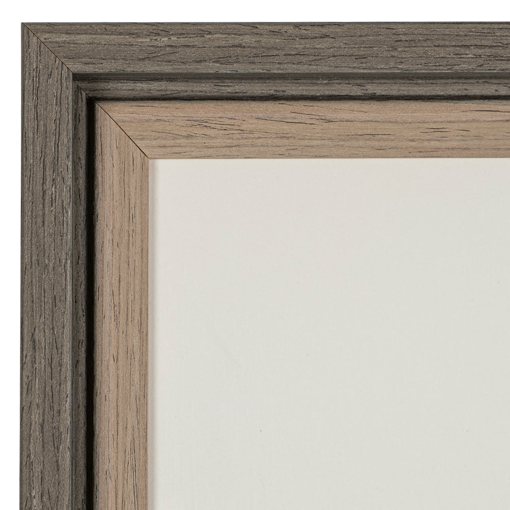 Close-up of the embroidery artwork's wooden frame detail.