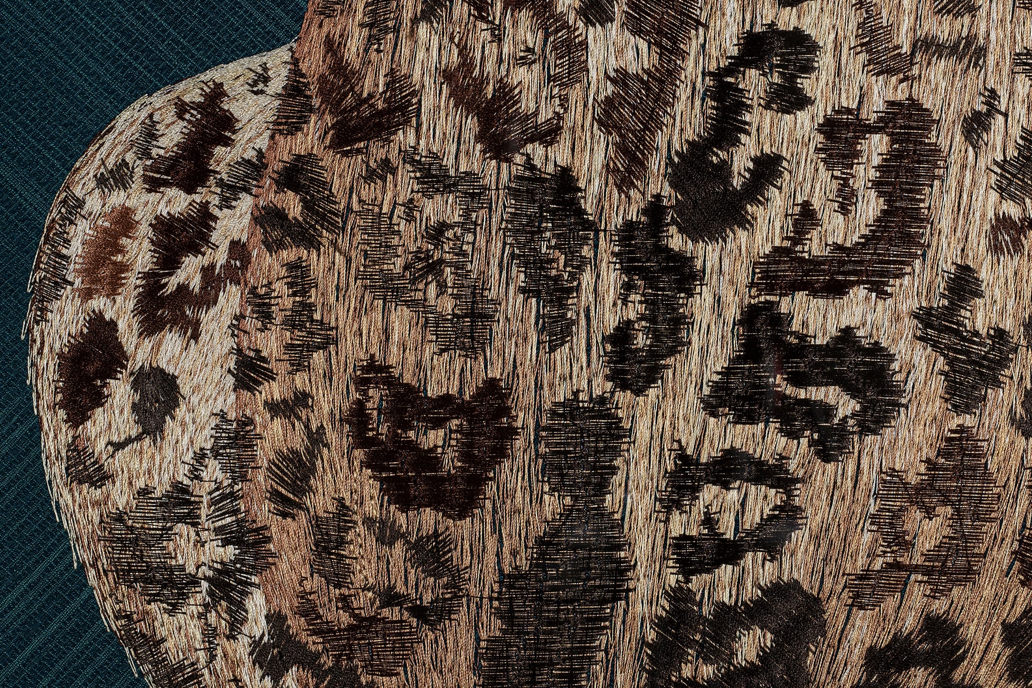 The fur details of the leopard design in embroidery fine wall art.