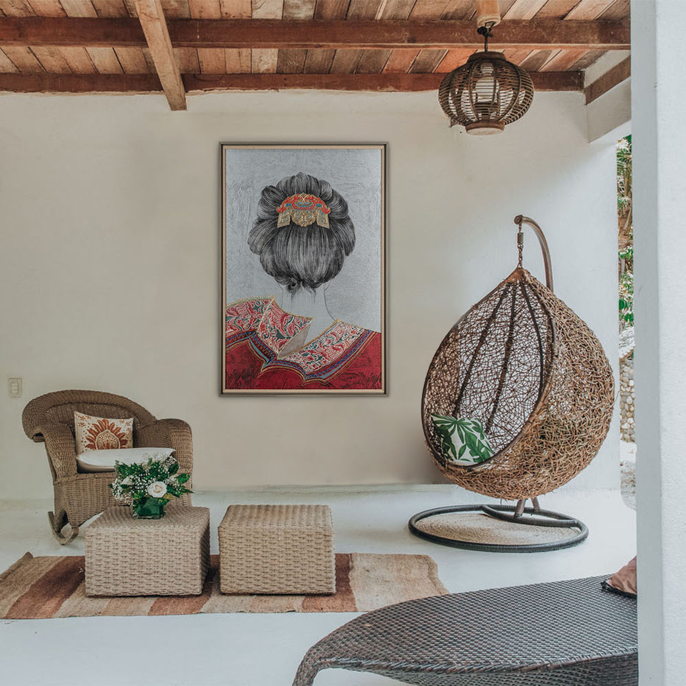 A piece of embroidery art embroidered with the back of a female figure is hung on the outdoor terrace, and it is very artistic matching with rattan and bamboo woven home.