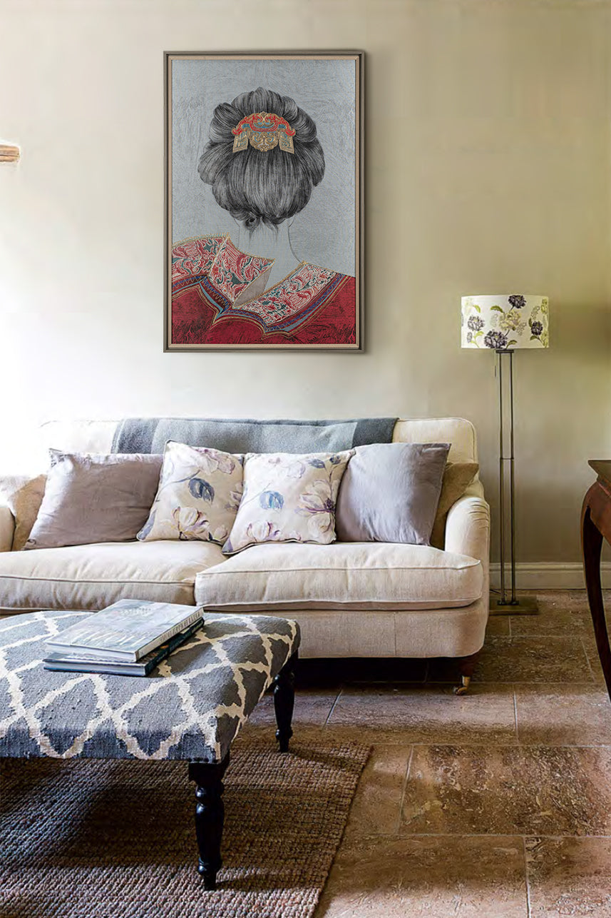 An embroidered work of art showing a woman&