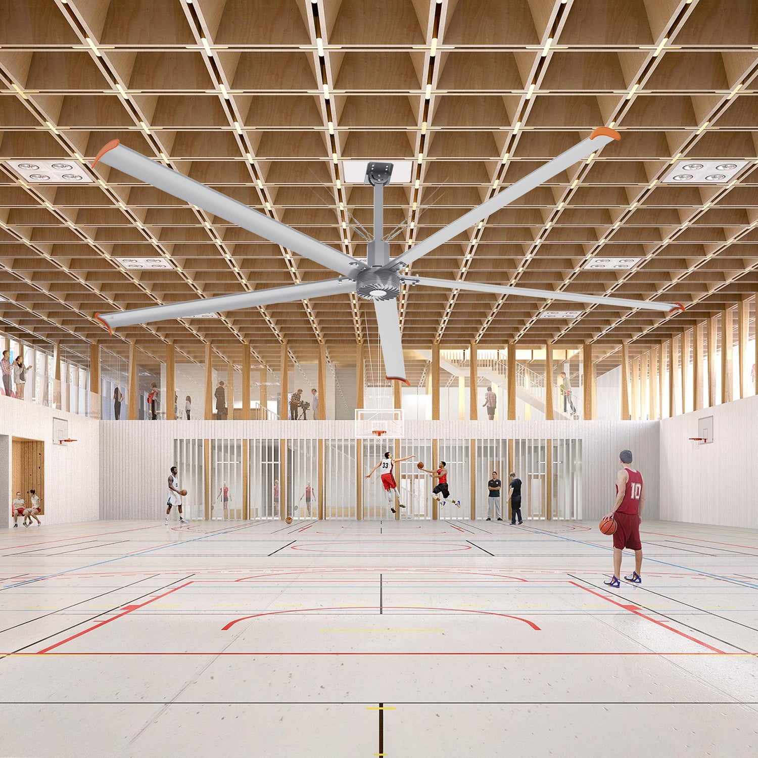 Makani 14ft industrial HVLS ceiling fan installed in a gymnasium, circulating air to create a comfortable environment for athletes and spectators in a spacious indoor sports facility. 