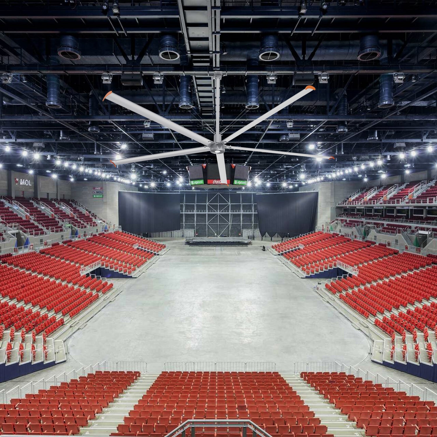 Makani 16ft industrial HVLS ceiling fan in a gymnasium, with 240V power, effectively circulating air to maintain a cool and comfortable environment for indoor sports and activities. 