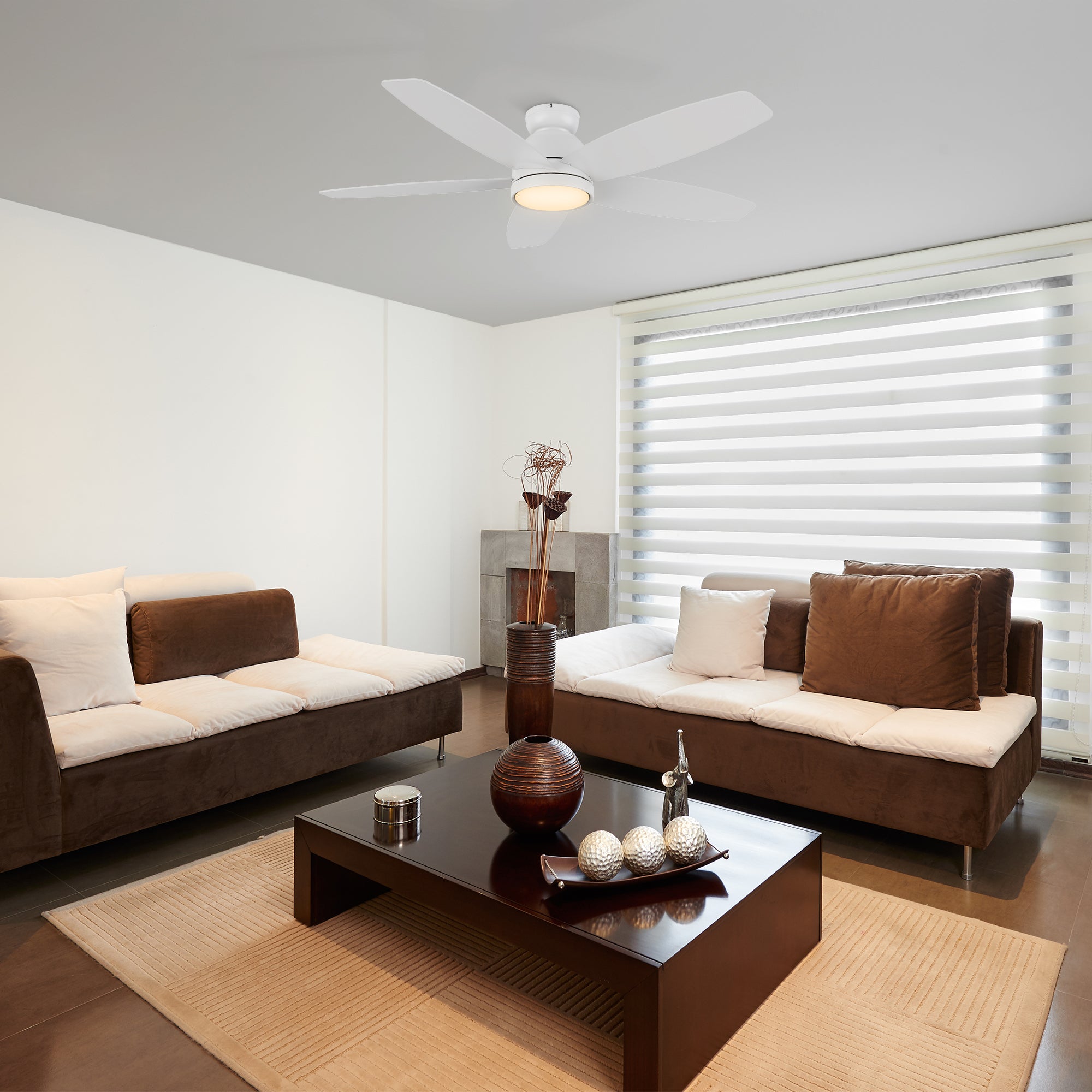 The white low profile fan boasts a simple design with a white finish, elegant Plywood blades and an integrated 4000K LED cool light. Additionally, the fan comes equipped with a remote control to allow you to easily set your fan preferences. 