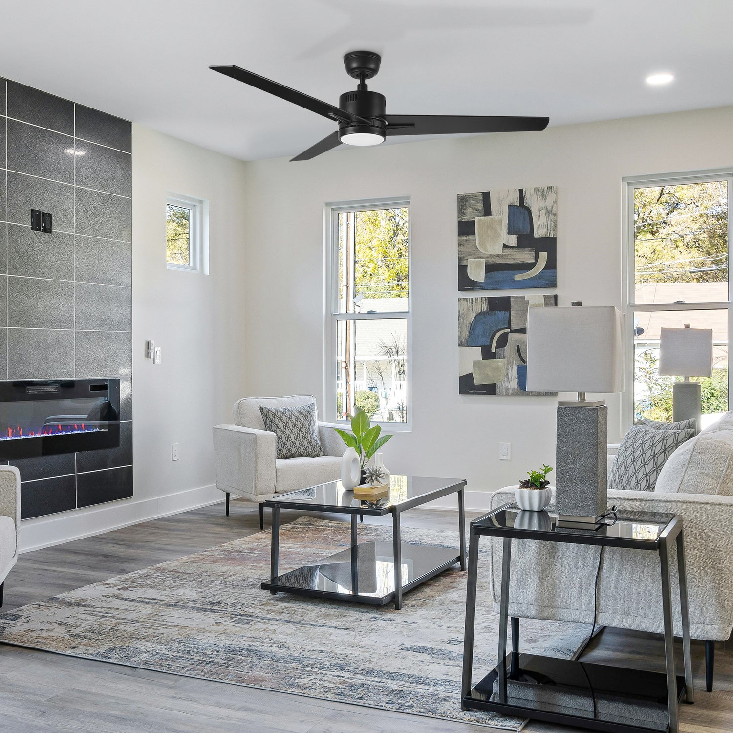 Skobeloff 52-inch ceiling fan with LED light, placed in a modern living room, providing energy-efficient cooling and elegant style. 