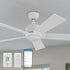 Smafan Carro Aspen 48-inch Smart Outdoor Ceiling Fan with LED light, featuring white blades, mounted on a gray ceiling for efficient airflow and cooling.  The ceiling fan is shown with a Carro white wall switch, a handheld remote, and a smartphone displaying a control app, highlighting smart operation for customizable lighting and cooling in indoor or outdoor settings. 