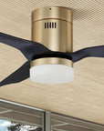 Carro Striver 48 inch outdoor ceiling fan with black and gold design, flush mounted in a smart home. 