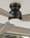 The Smafan Trendsetter Smart Ceiling Fan with 3 blades and a 60-inch blade sweep with a flush mounted motor case and tropical inspired blades. 