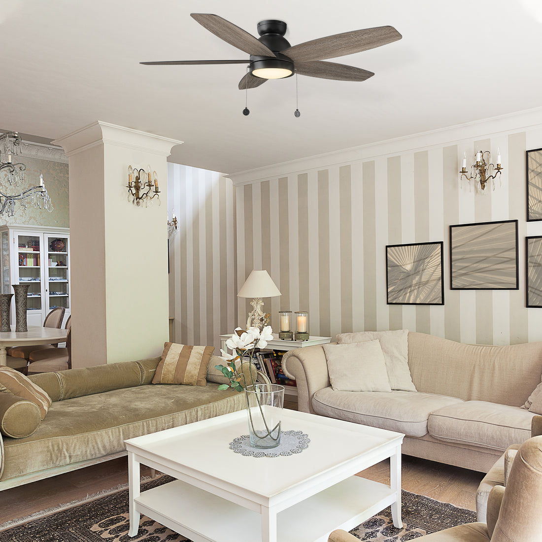 An elegant living room decor featuring the Treyton 52 inch Pull Chain Ceiling Fan with Light Kit.
