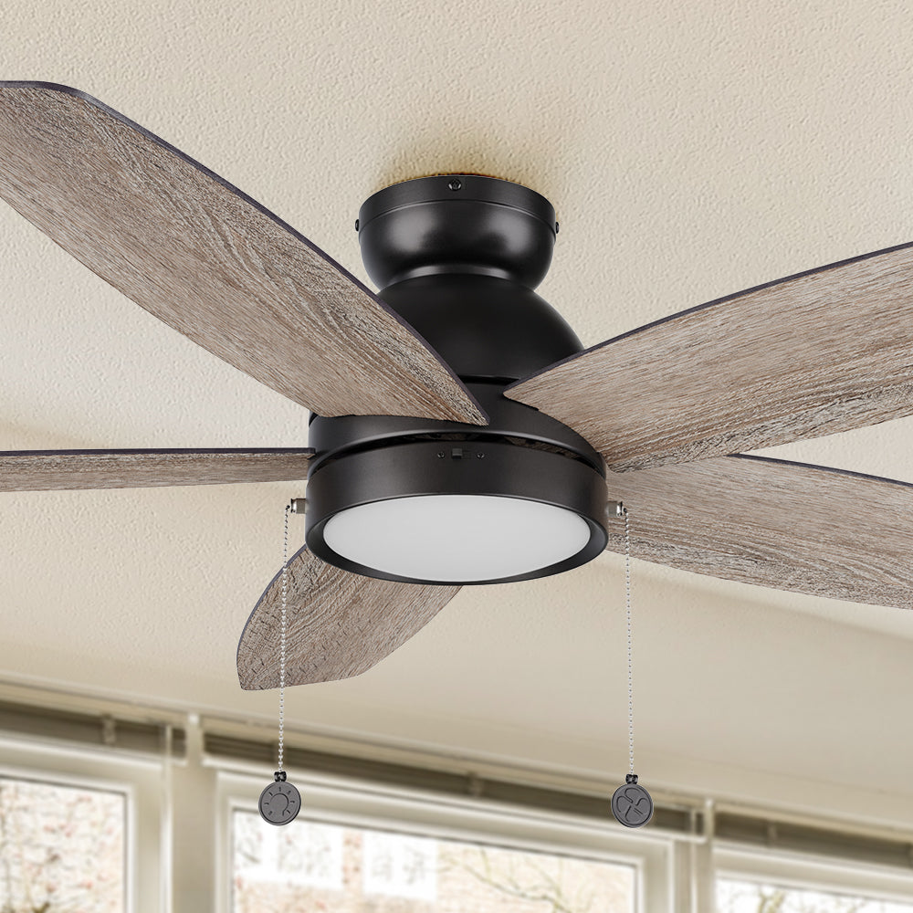 A pristine dark wood exterior, elegant plywood blades, and a charming LED lighting come together to create the subtle yet refined Treyton 52 inch pull chain ceiling fan. #color_wood