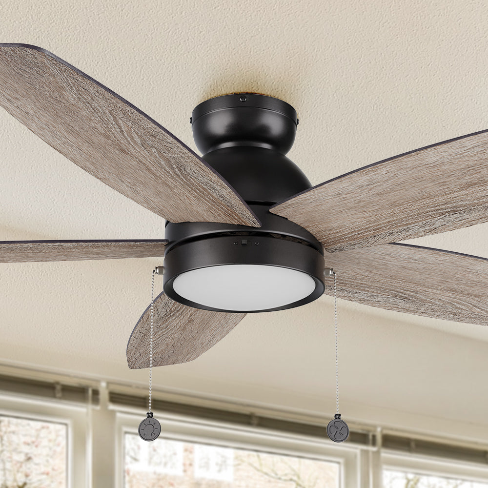 A pristine dark wood exterior, elegant plywood blades, and a charming LED lighting come together to create the subtle yet refined Treyton 52 inch pull chain ceiling fan. #color_Wood
