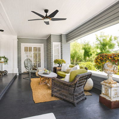 Smafan Voyager 52 inch modern matte black 5 blade outdoor ceiling fan with light installed on a covered porch with wicker patio furniture. #color_black-gold