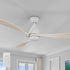 White 3-blade wood ceiling fan with light for vaulted ceilings, controlled by a handheld remote in a modern white room. 