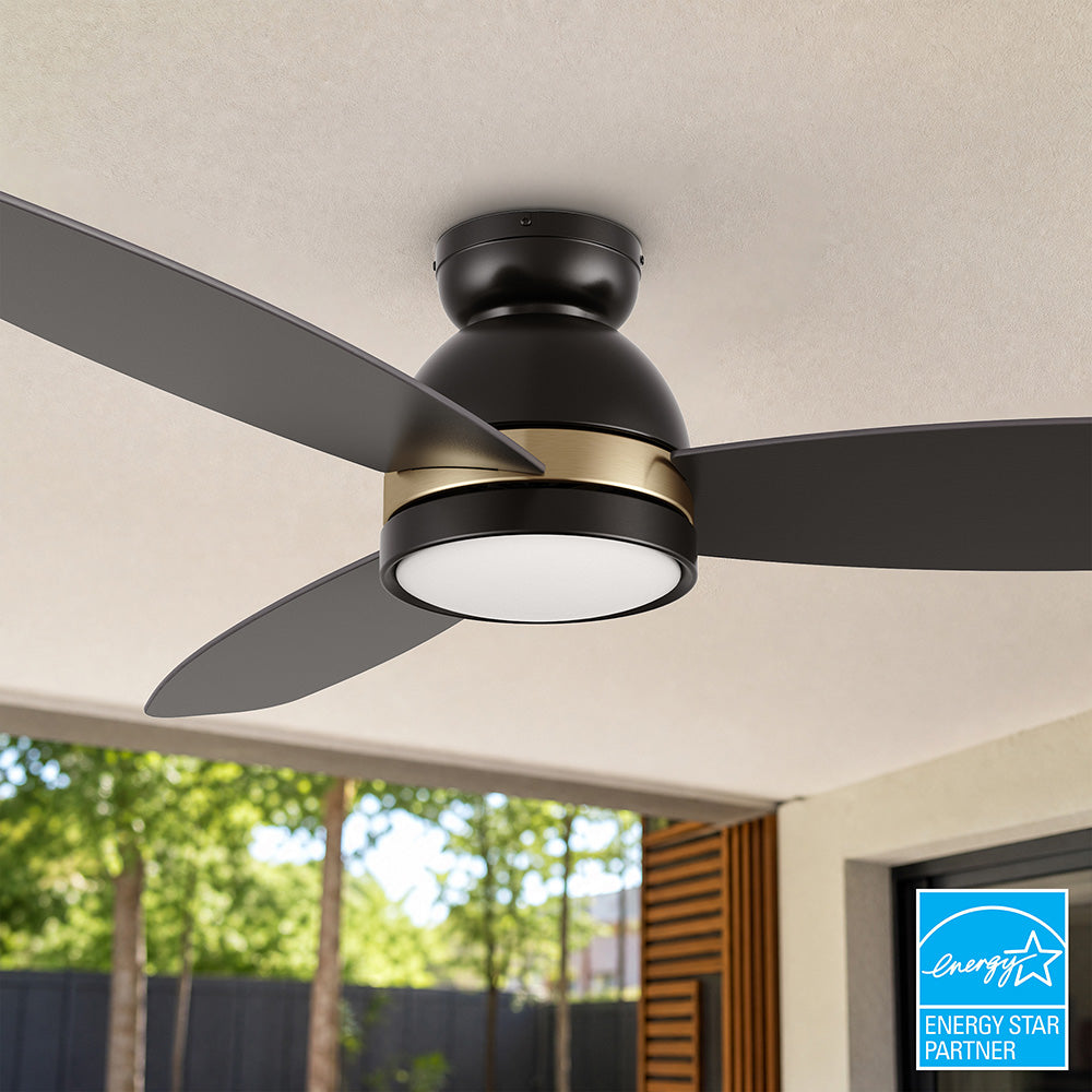 Energy Star certified flush mount  ceiling fan with LED light installed on a covered patio ceiling. 