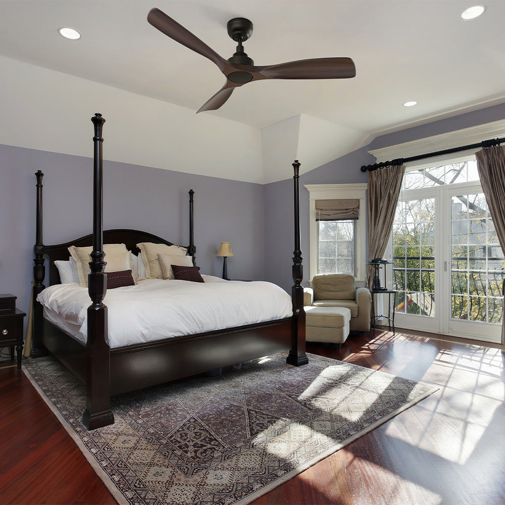 Elegant bedroom with dark four-poster bed and Smafan Kilk 52" modern dark wood ceiling fan on vaulted white ceiling. Answers can I put ceiling fan over bed – yes, with proper mounting. 