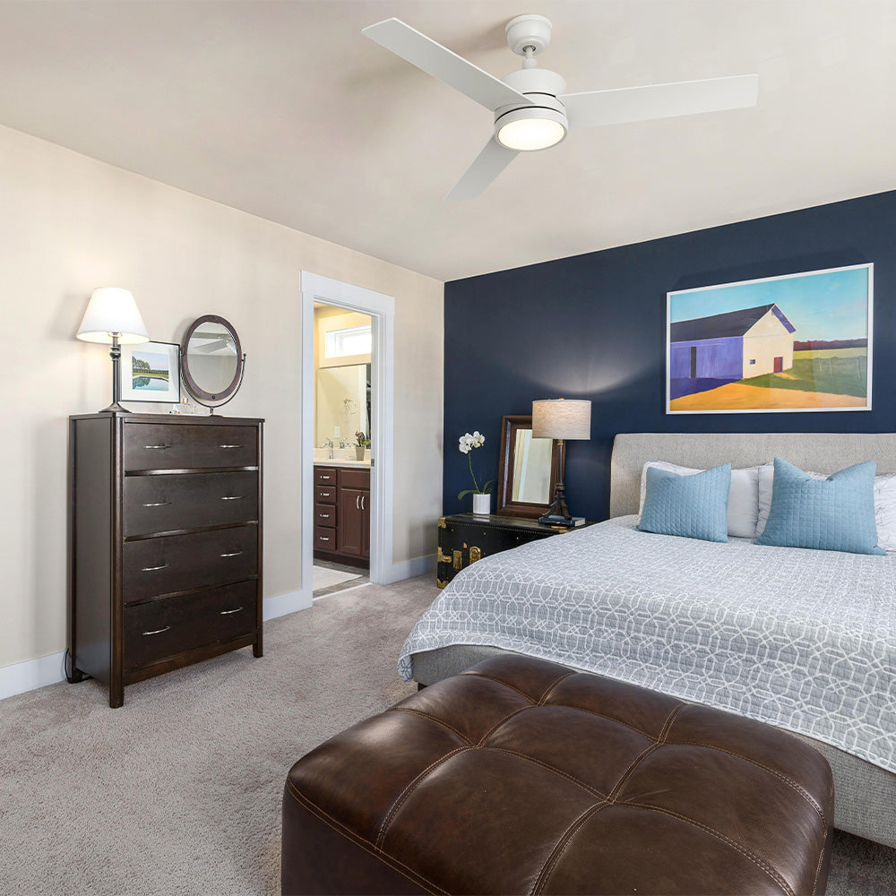 Modern bedroom with Smafan Louy 52" 3-blade ceiling fan with light, navy accent wall, upholstered bed, and clean decor. A bedroom ceiling fan with light in crisp white finish. 