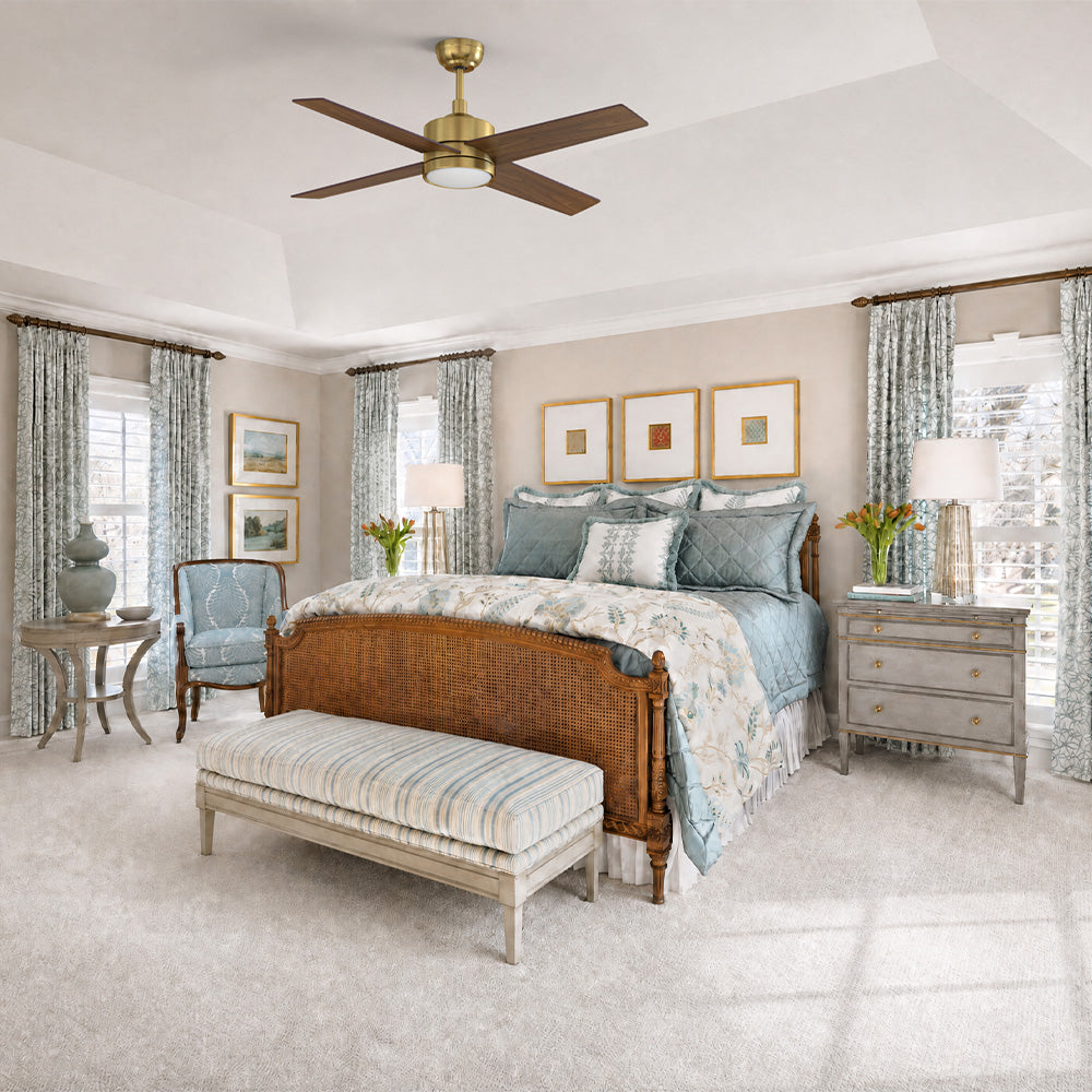 Cozy traditional bedroom with Smafan Rossendale 52" wood ceiling fan in gold with light, wooden bed frame, neutral tones, and soft lighting. A quiet ceiling fan for bedroom for restful sleep. 
