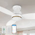White 48-inch low-profile smart outdoor ceiling fan with integrated LED light, remote, wall switch, smartphone app control, and modern minimalistic design. 