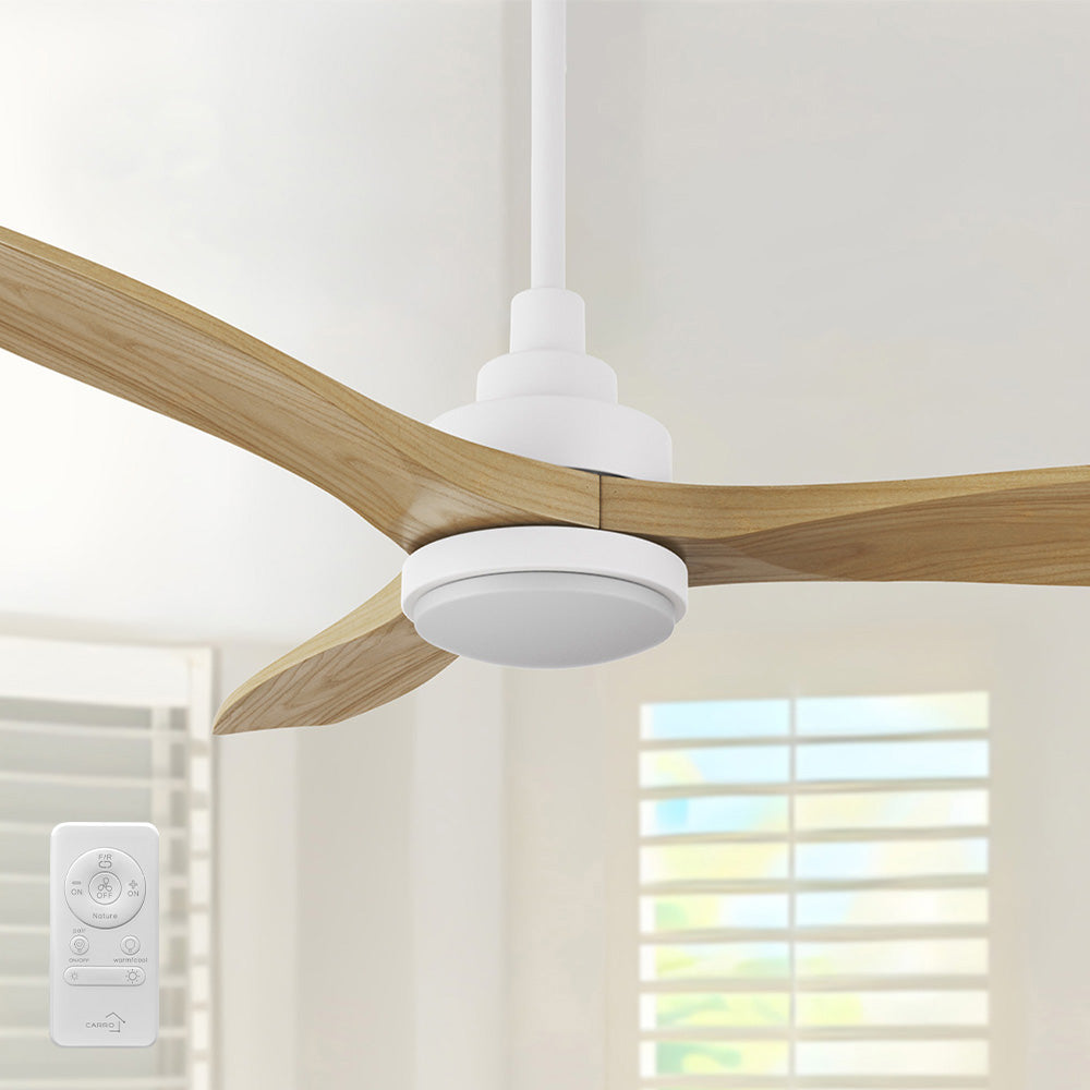 Close view of Ultiem 48-inch ceiling fan in light-wood finish with three sculpted blades, short downrod, and round integrated LED light, shown against a neutral wall with window blinds. #color_light-wood