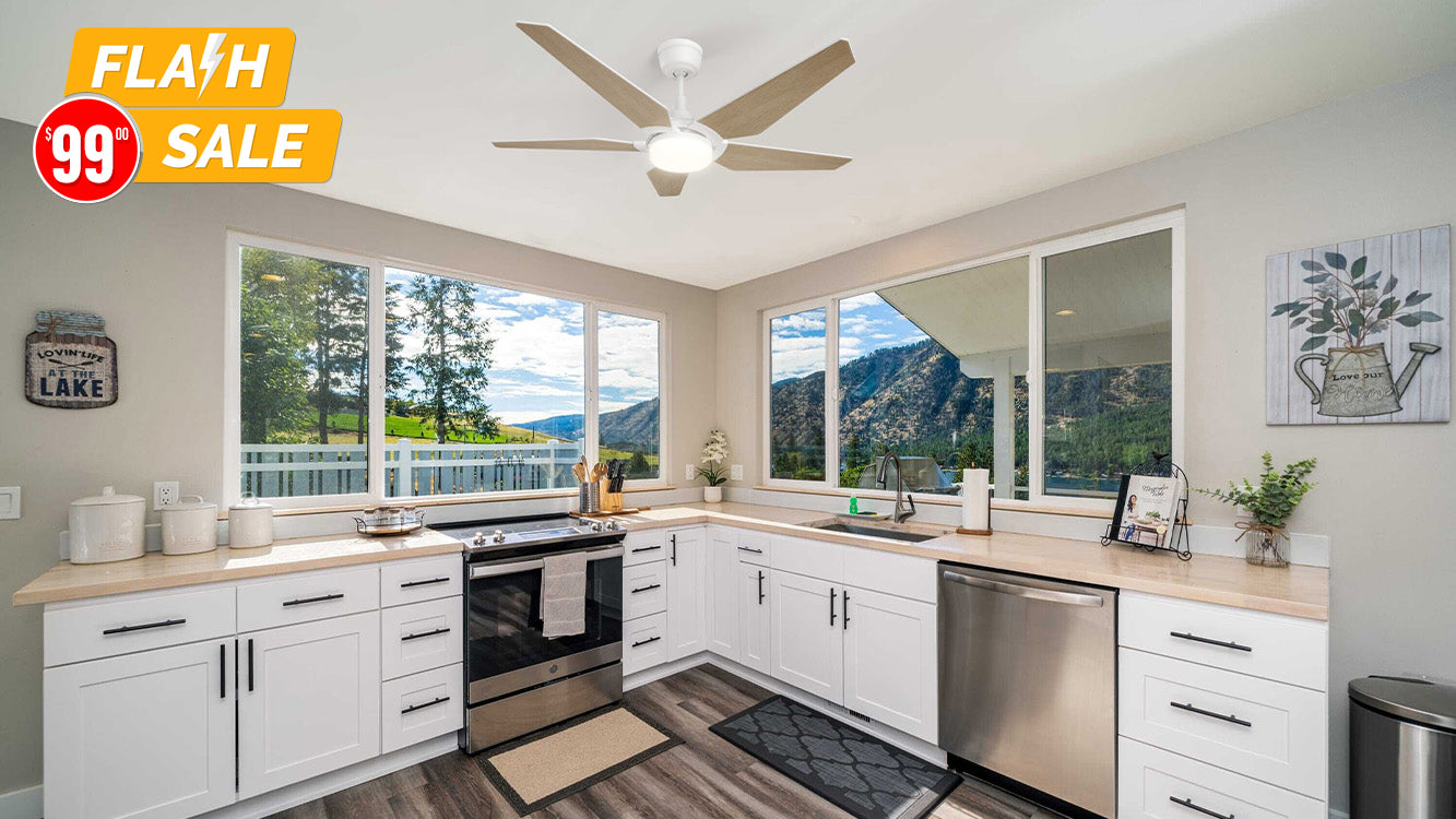A bright modern kitchen featuring the Smafan Voyager Outdoor Smart Ceiling Fan with Light. The fan’s energy-efficient LED light kit provides brilliant illumination, ideal for large indoor living spaces like open kitchens, enhancing both style and comfort.
