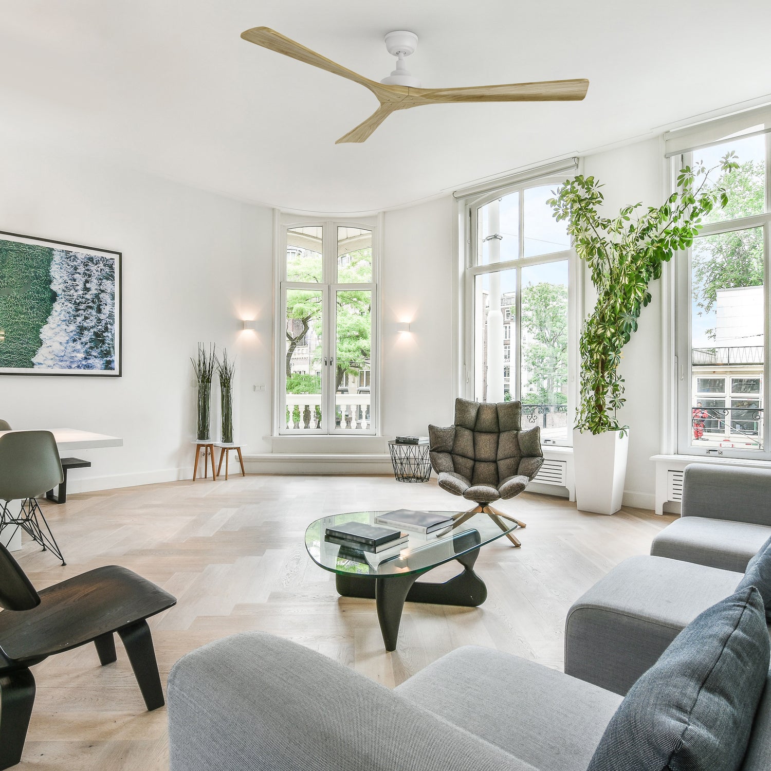 Thora 60-inch farmhouse ceiling fan with solid wood blades and a white motor, installed in an elegant, contemporary living room. Features a quiet and energy-saving DC motor. 