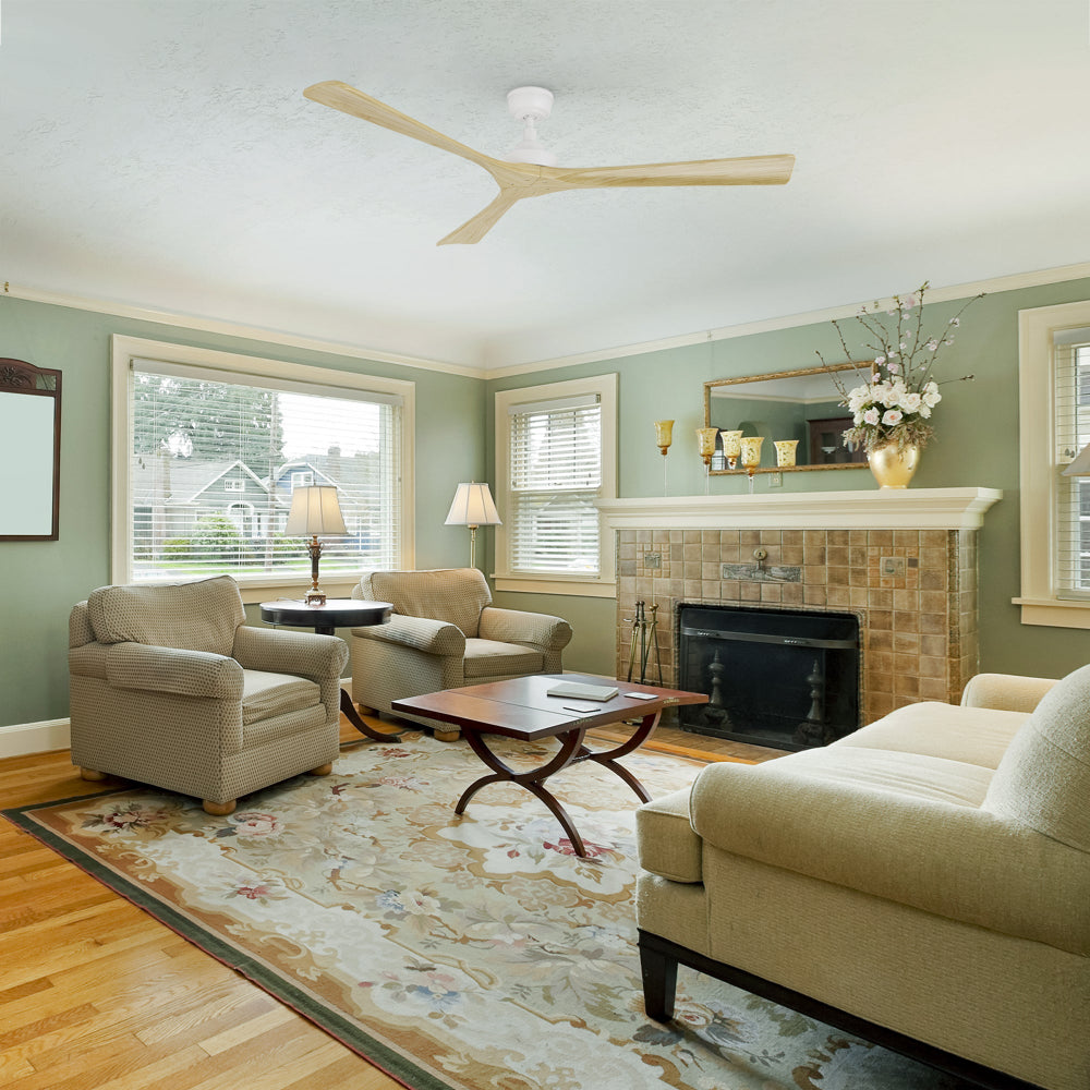 Thora 60-inch farmhouse ceiling fan with a white motor and wood blades, installed in a modern living room with mint green wall. Features quiet DC motor technology and reversible airflow for year-round use. 