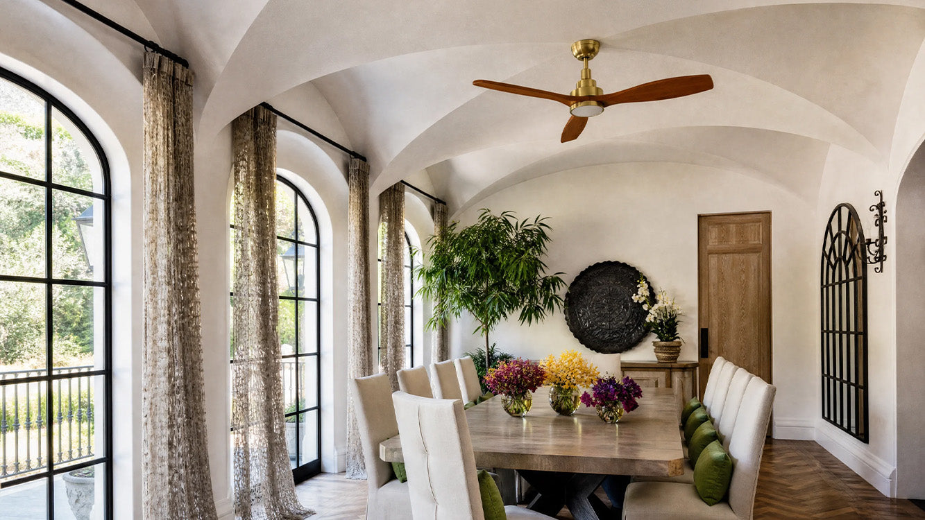 Smafan Ultiem 48 inch brushed gold wood ceiling fan with light installed in a luxury mid-century bedroom.