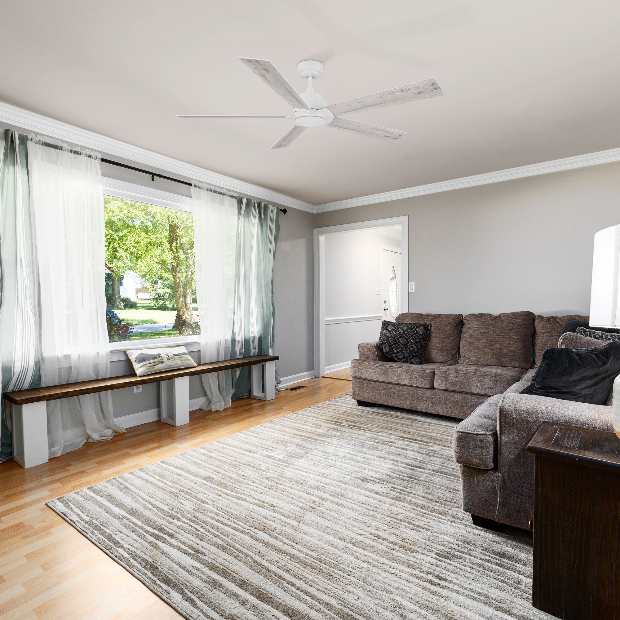 Carro Welland 60 inch remote control ceiling fans boasts a simple design with a White finish and elegant Plywood blades, will keep your living space cool and stylish. 