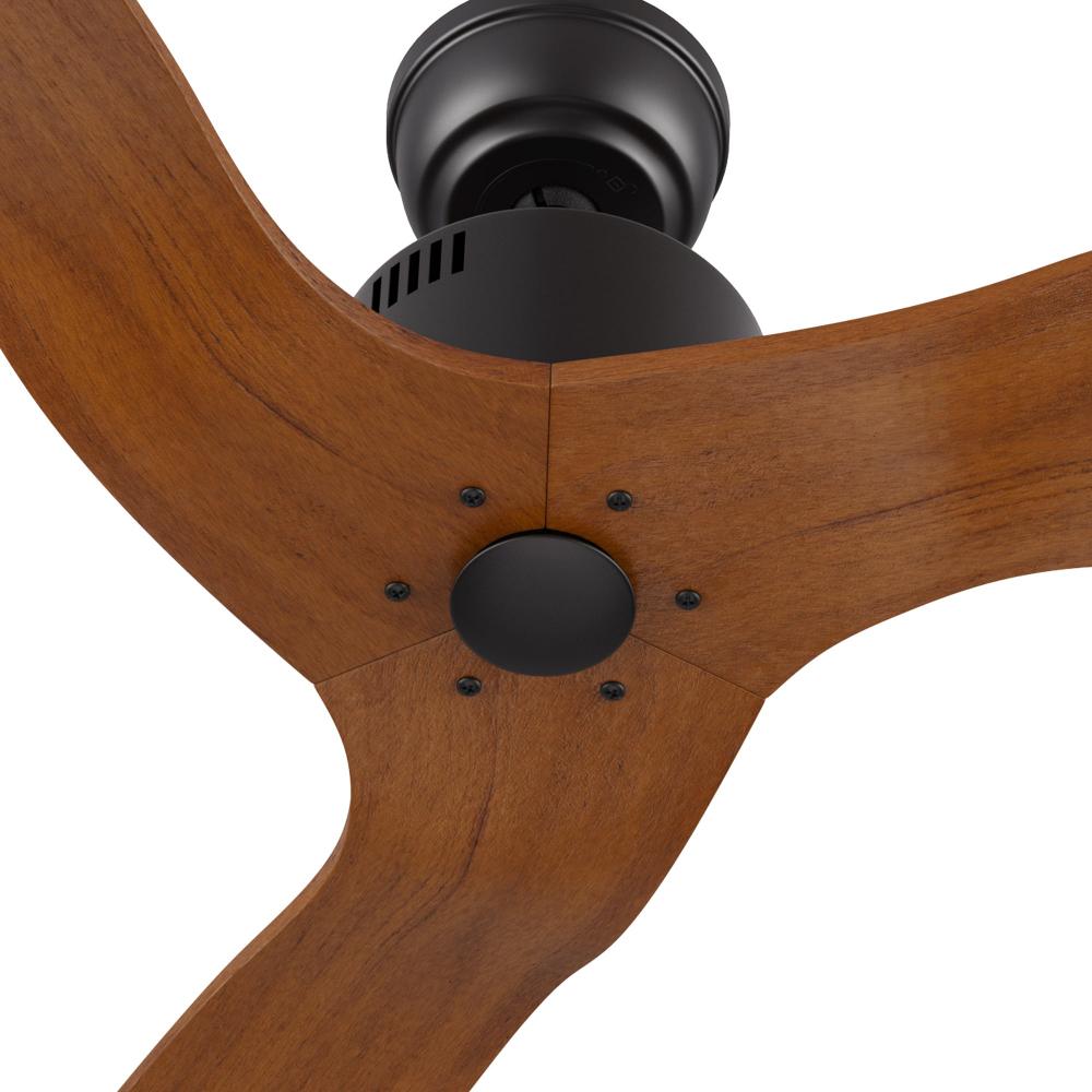 Close-up view of the Yarmouth black farmhouse ceiling fan, showcasing its robust black motor housing and natural wood blade texture. 