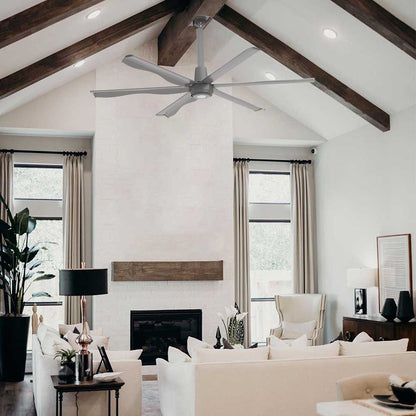 8ft large commercial ceiling fan installed in classic dark-wood style living room with purlins. 