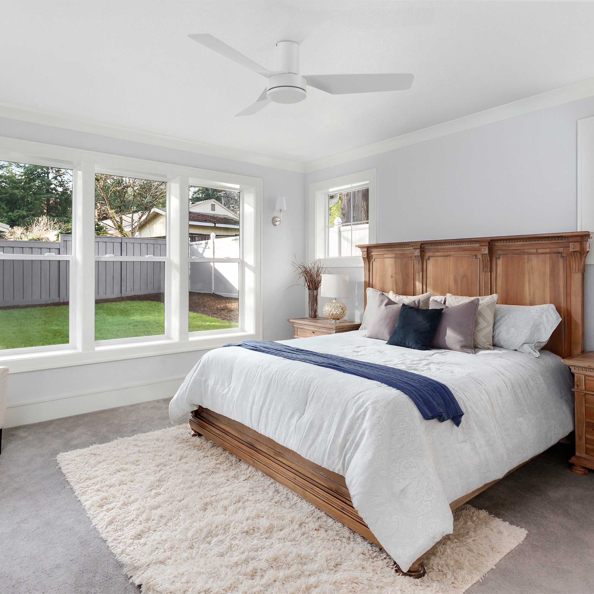 Whisper-quiet morning in your bedroom with the 44inch low profile Ceiling Fan. Remote-controlled, reversible motor, and durable ABS blades for personalized comfort. #color_white